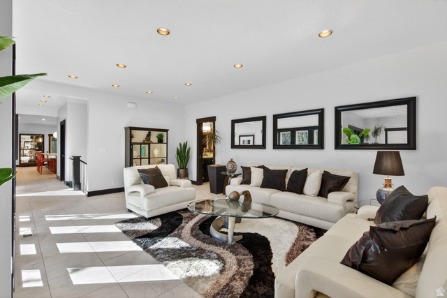145 Carnesecca Court Mapleton, UT 84664 - Photo 12 of 109 Living room featuring recessed lighting and light tile patterned floors