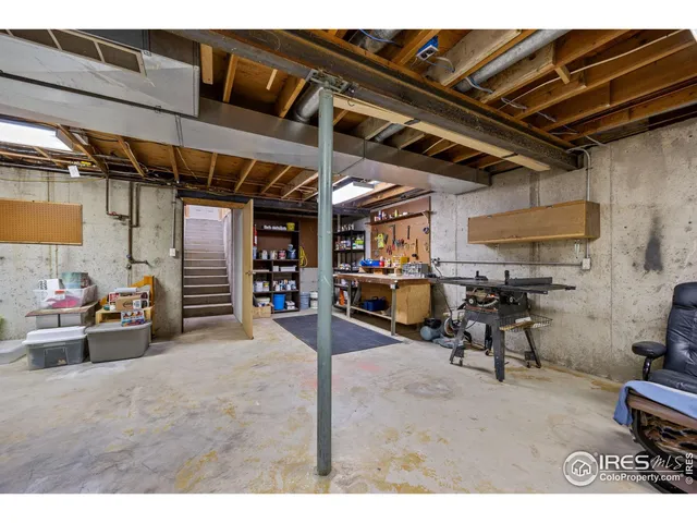 a bathroom with a toilet sink and vanity
