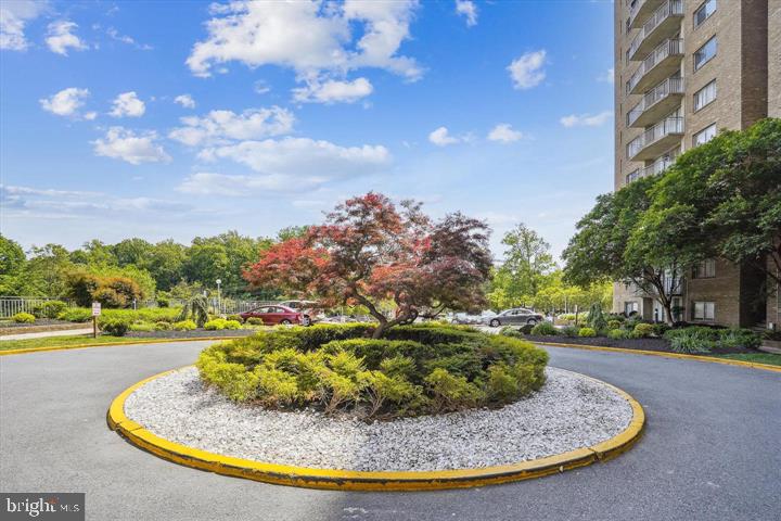 1836 Metzerott Road, Unit 1524 Hyattsville, MD 20783 - Photo 4 of 22 a view of a swimming pool with an outdoor seating
