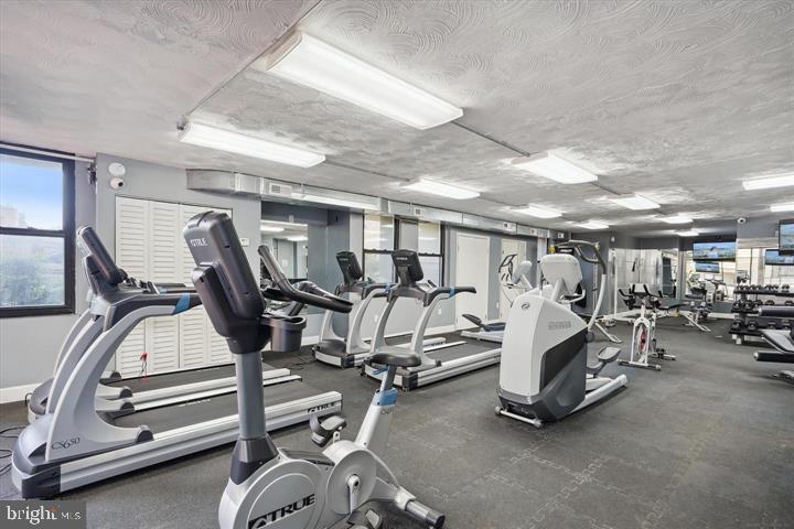 1836 Metzerott Road, Unit 1524 Hyattsville, MD 20783 - Photo 8 of 22 a view of a room with gym equipment