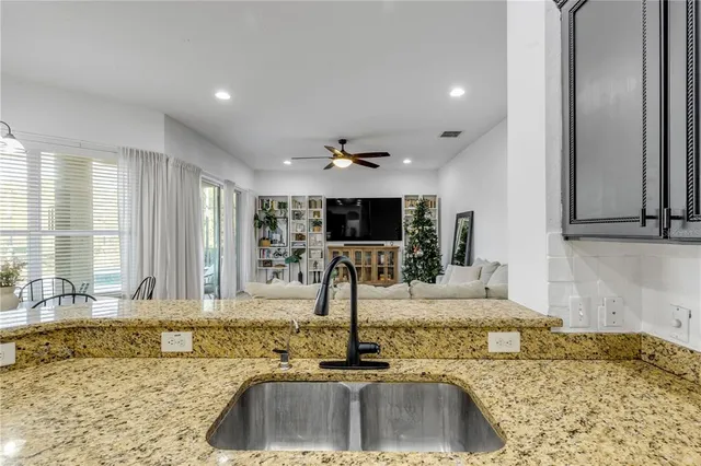 a view of a swimming pool with a porch