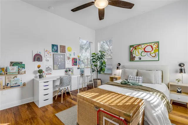 a bedroom with a bed and furniture