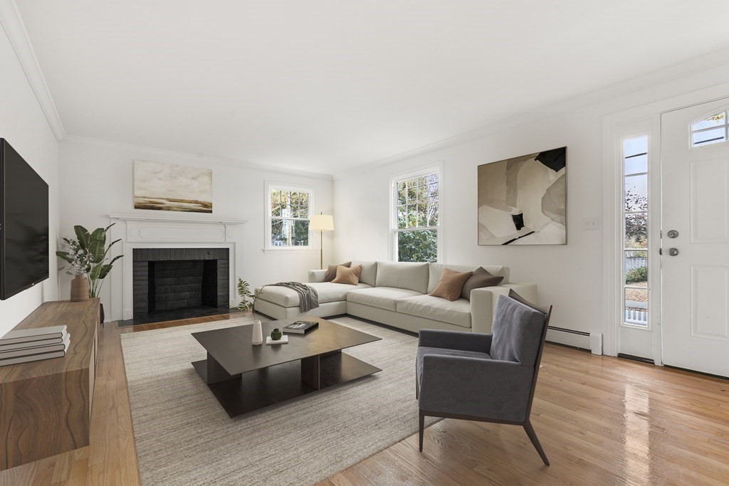 59 Overlook Road Marblehead, MA 01945 - Photo 6 of 16 a living room with furniture a window and a fireplace