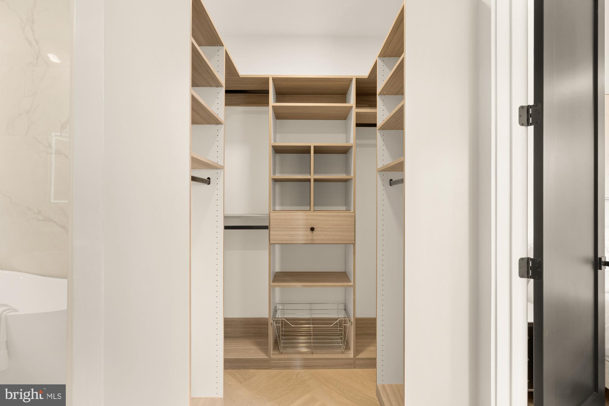 733 Euclid Street Northwest, Unit 302 Washington, DC 20001 - Photo 31 of 55 a view of walk in closet with empty racks