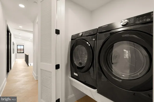 a bedroom with a bed and a mirror