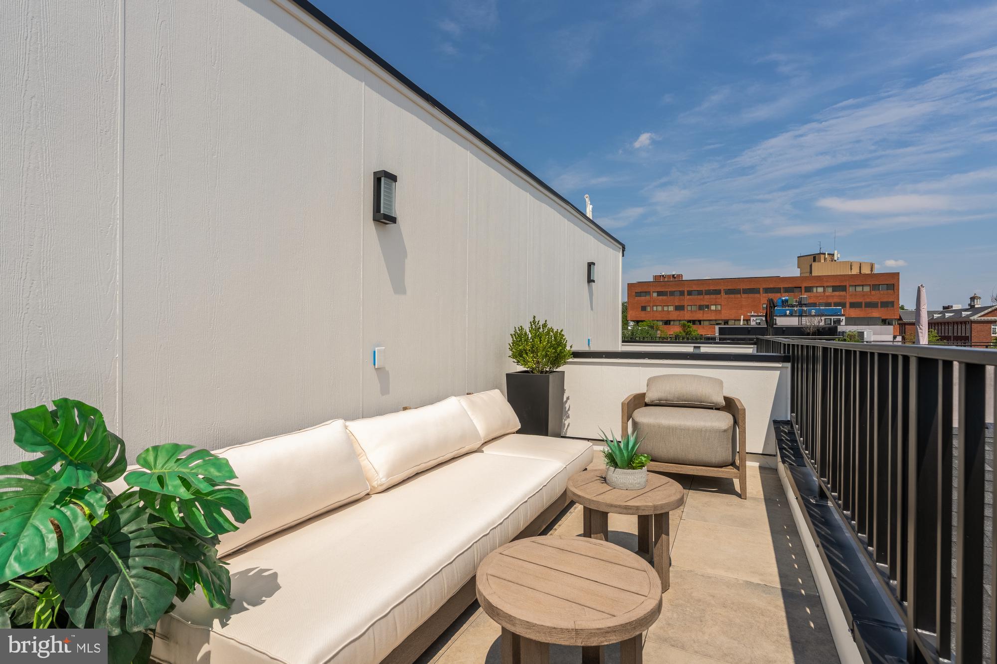 733 Euclid Street Northwest, Unit 302 Washington, DC 20001 - Photo 51 of 55 a outdoor living room with furniture and a potted plant