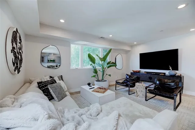 a bedroom with bed and window