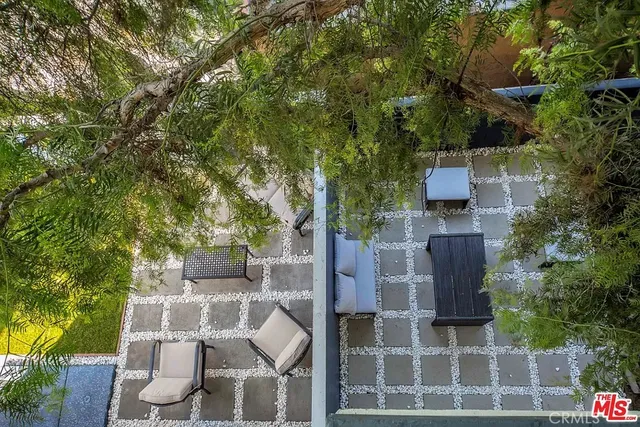 a front view of a house with garage