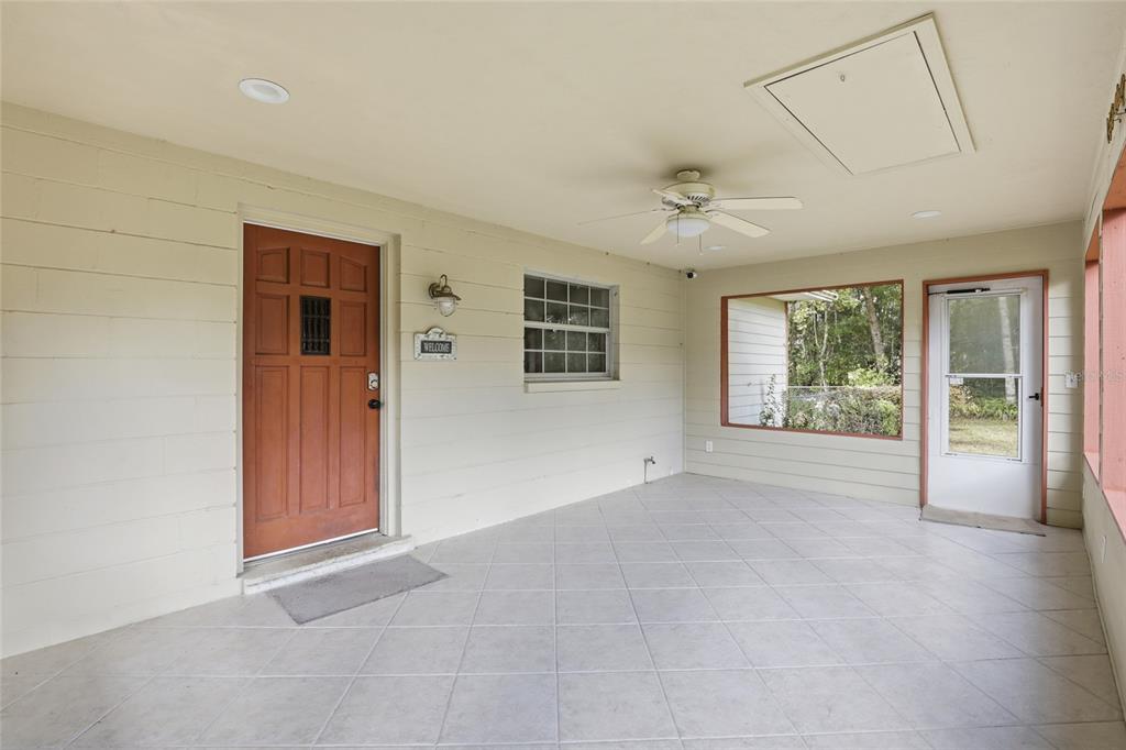 24214 Northwest 52nd Terrace Alachua, FL 32615 - Photo 4 of 22 an empty room with windows and closet