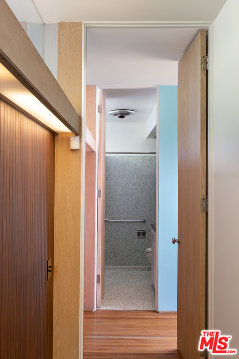 1531 North Tigertail Road Los Angeles, CA 90049 - Photo 12 of 27 a bathroom with a shower and a sink