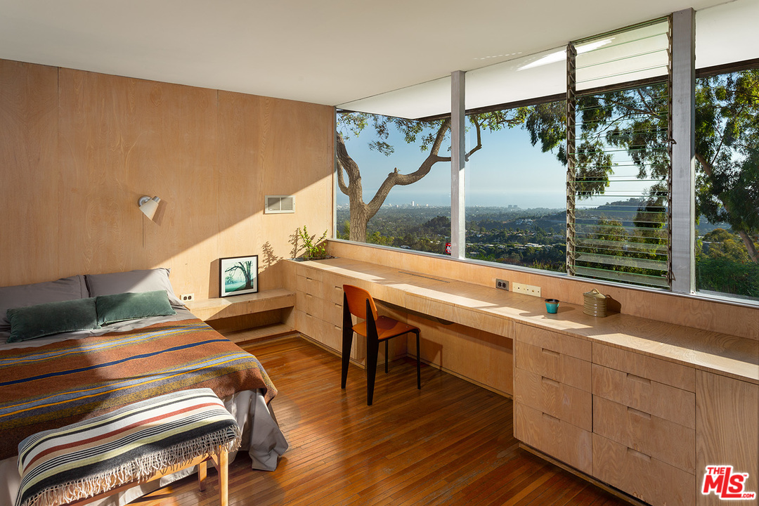 1531 North Tigertail Road Los Angeles, CA 90049 - Photo 13 of 27 a room with lots of furniture and wooden floor
