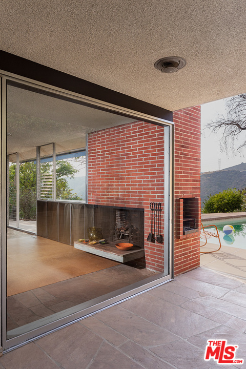 1531 North Tigertail Road Los Angeles, CA 90049 - Photo 21 of 27 a view of livingroom with furniture and floor to ceiling window