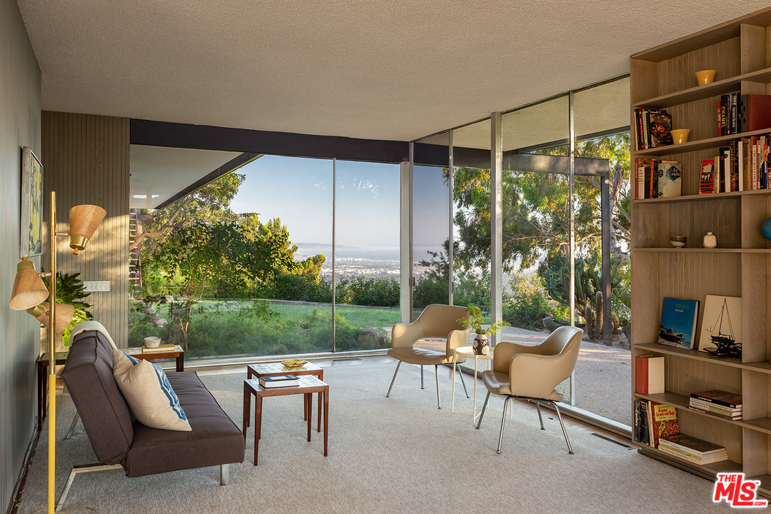 1531 North Tigertail Road Los Angeles, CA 90049 - Photo 6 of 27 a backyard of a house with outdoor seating