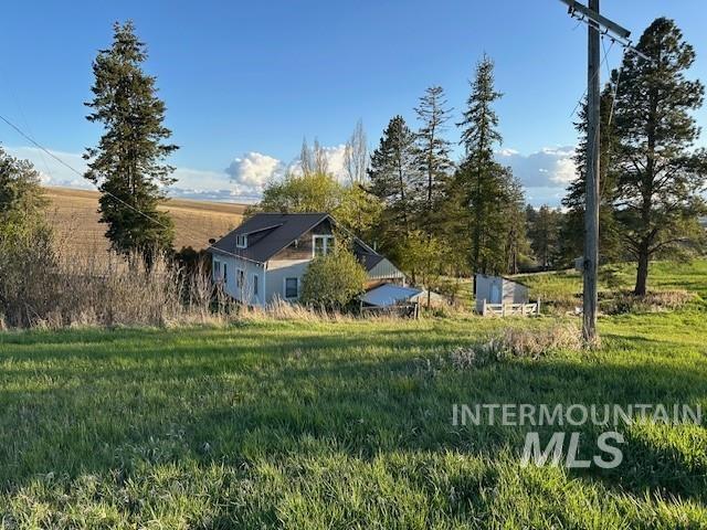 21 B Howard Road Palouse, WA 99161 - Photo 6 of 13 View of grassy yard featuring a view of countryside