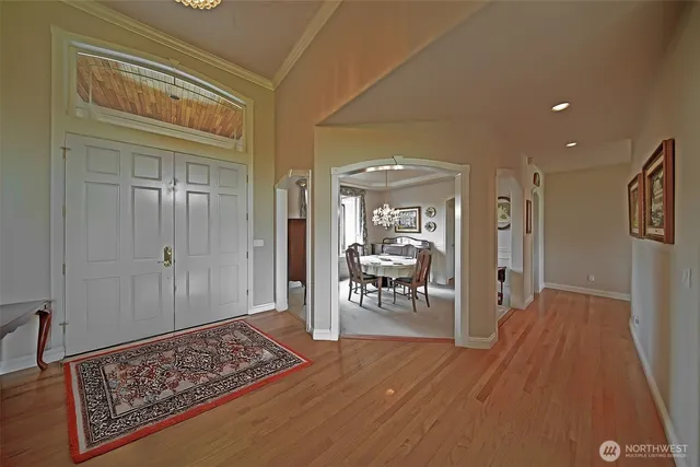 a area with furniture and a wooden floor