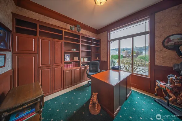 a room with furniture and a window