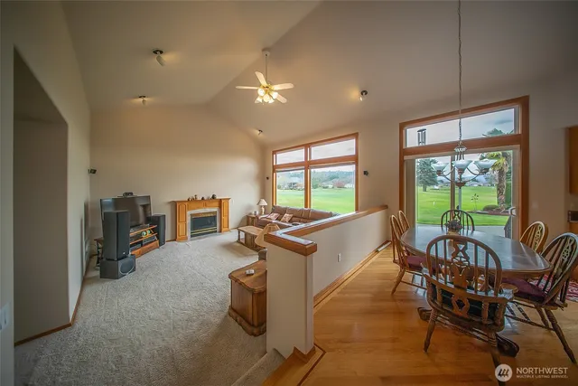 a kitchen with a table and chairs in it