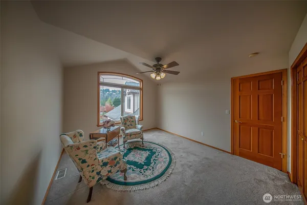 a view of a livingroom with furniture