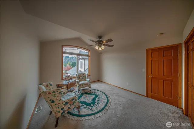 a view of a livingroom with furniture