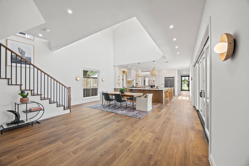 4557 Ridge Road Dallas, TX 75229 - Photo 14 of 37 a dining room with furniture and wooden floor
