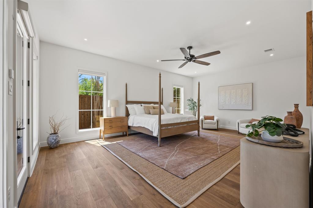 4557 Ridge Road Dallas, TX 75229 - Photo 17 of 37 a living room with furniture a table and a potted plant