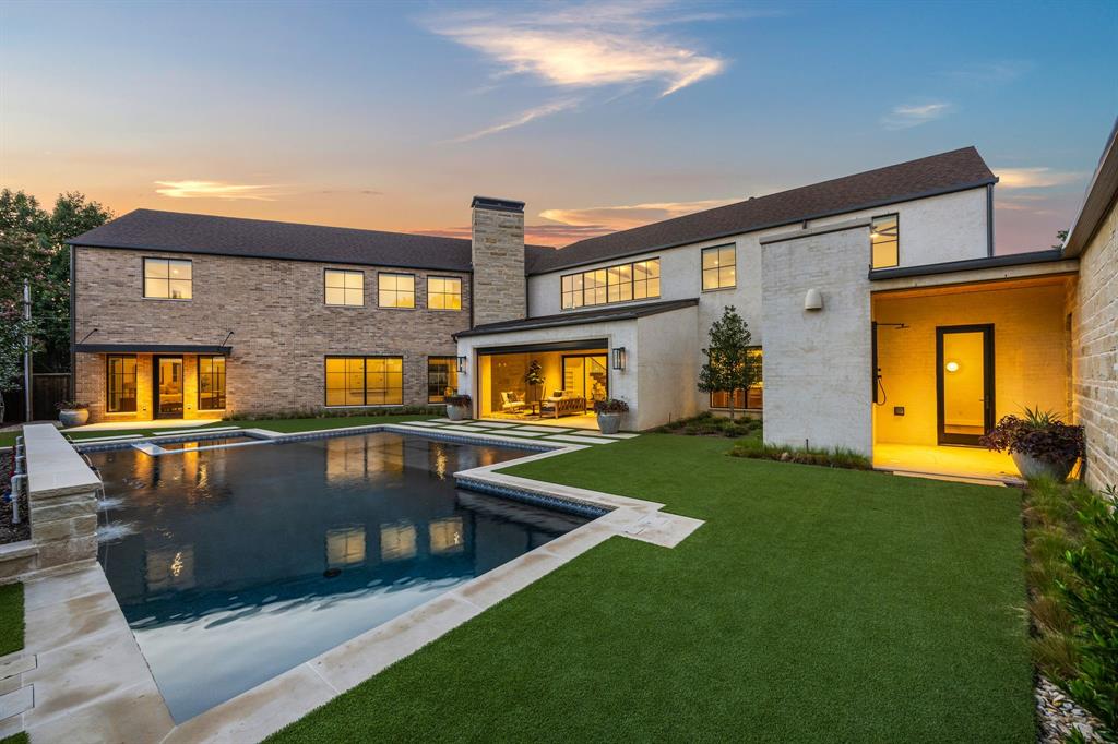 4557 Ridge Road Dallas, TX 75229 - Photo 2 of 37 a view of a house with a swimming pool