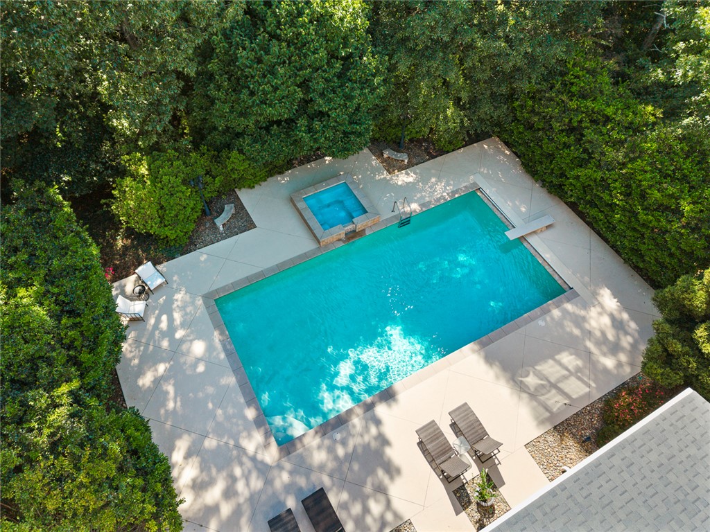 200 Graylyn Drive Anderson, SC 29621 - Photo 47 of 48 An aerial perspective reveals a sparkling outdoor pool and spa, framed by lush greenery.