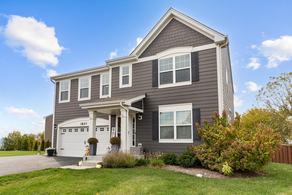 3827 Trillium Trail Elgin, IL 60124 - Photo 1 of 29 a view of a yard in front of a house