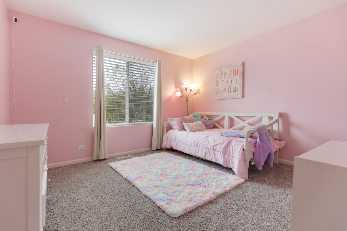 3827 Trillium Trail Elgin, IL 60124 - Photo 15 of 29 a bedroom with a bed and a window