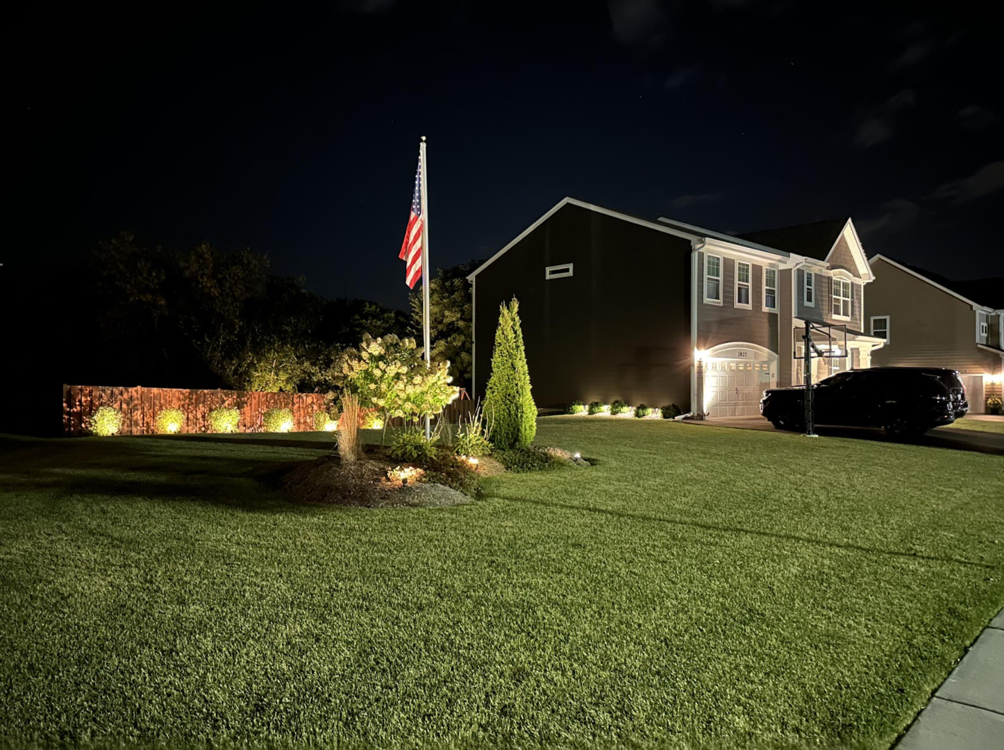 3827 Trillium Trail Elgin, IL 60124 - Photo 29 of 29 a front view of a house with a garden and yard