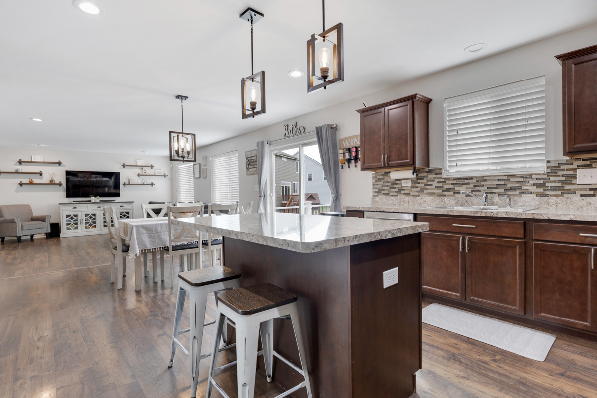 3827 Trillium Trail Elgin, IL 60124 - Photo 7 of 29 a kitchen with lots of counter space a sink and appliances