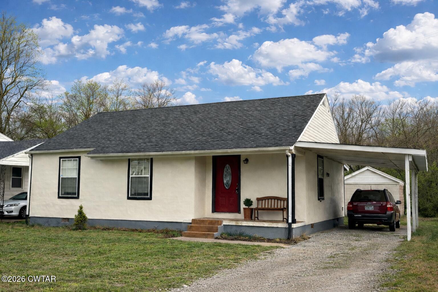 a house view with a garden space