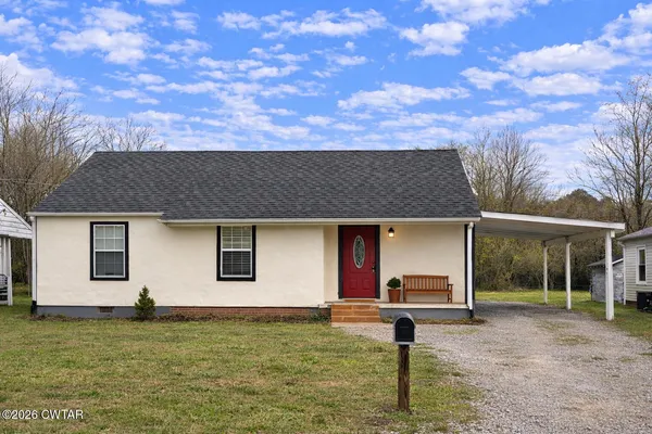 a front view of house with yard