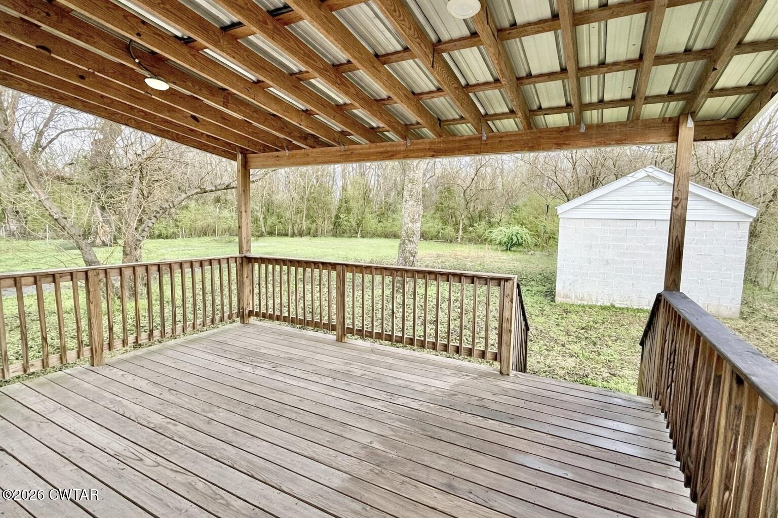 344 Phillips Street Jackson, TN 38301 - Photo 4 of 33 a view of a wooden deck