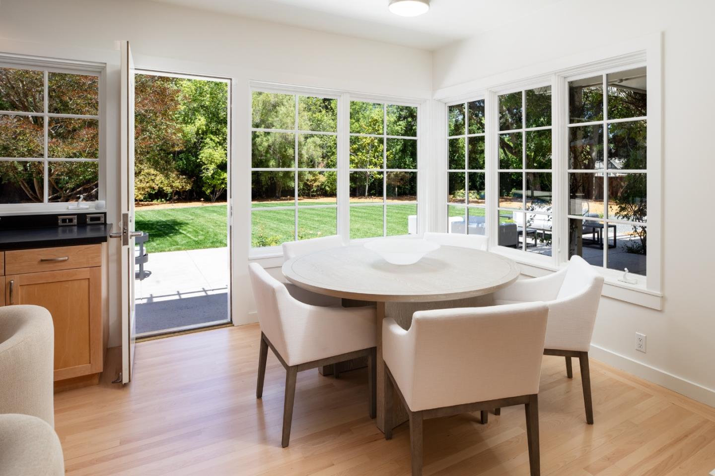 2 Mosswood Way Atherton, CA 94027 - Photo 11 of 38 a view of a dining room with furniture window and outside view