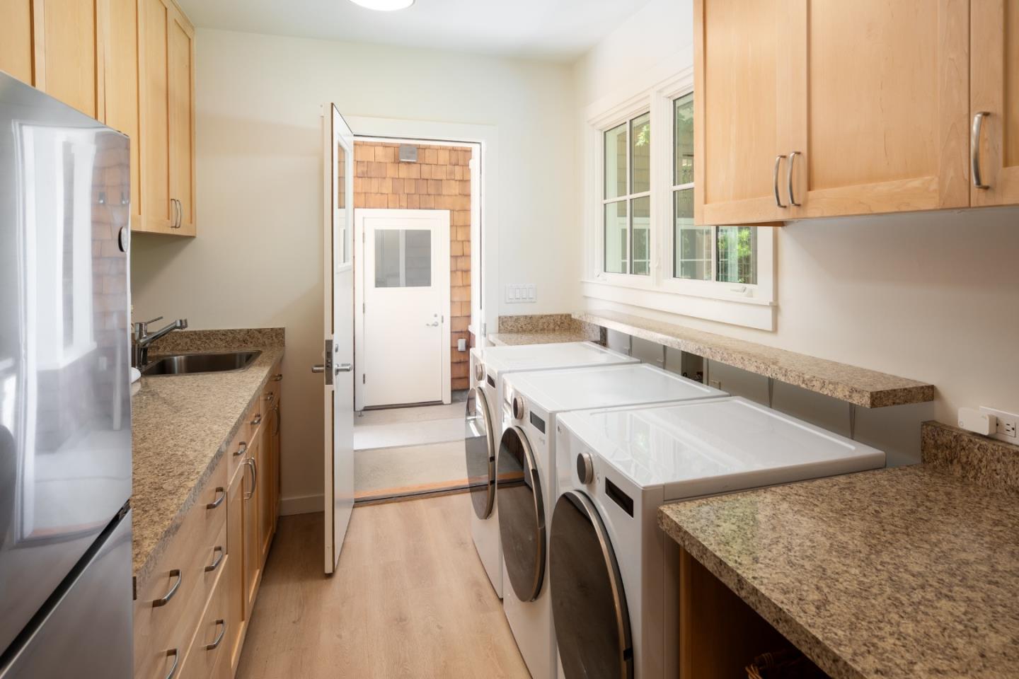 2 Mosswood Way Atherton, CA 94027 - Photo 12 of 38 a kitchen with a stove a sink and a refrigerator