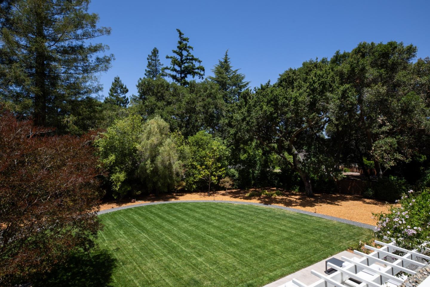 2 Mosswood Way Atherton, CA 94027 - Photo 20 of 38 a view of outdoor space with deck and yard