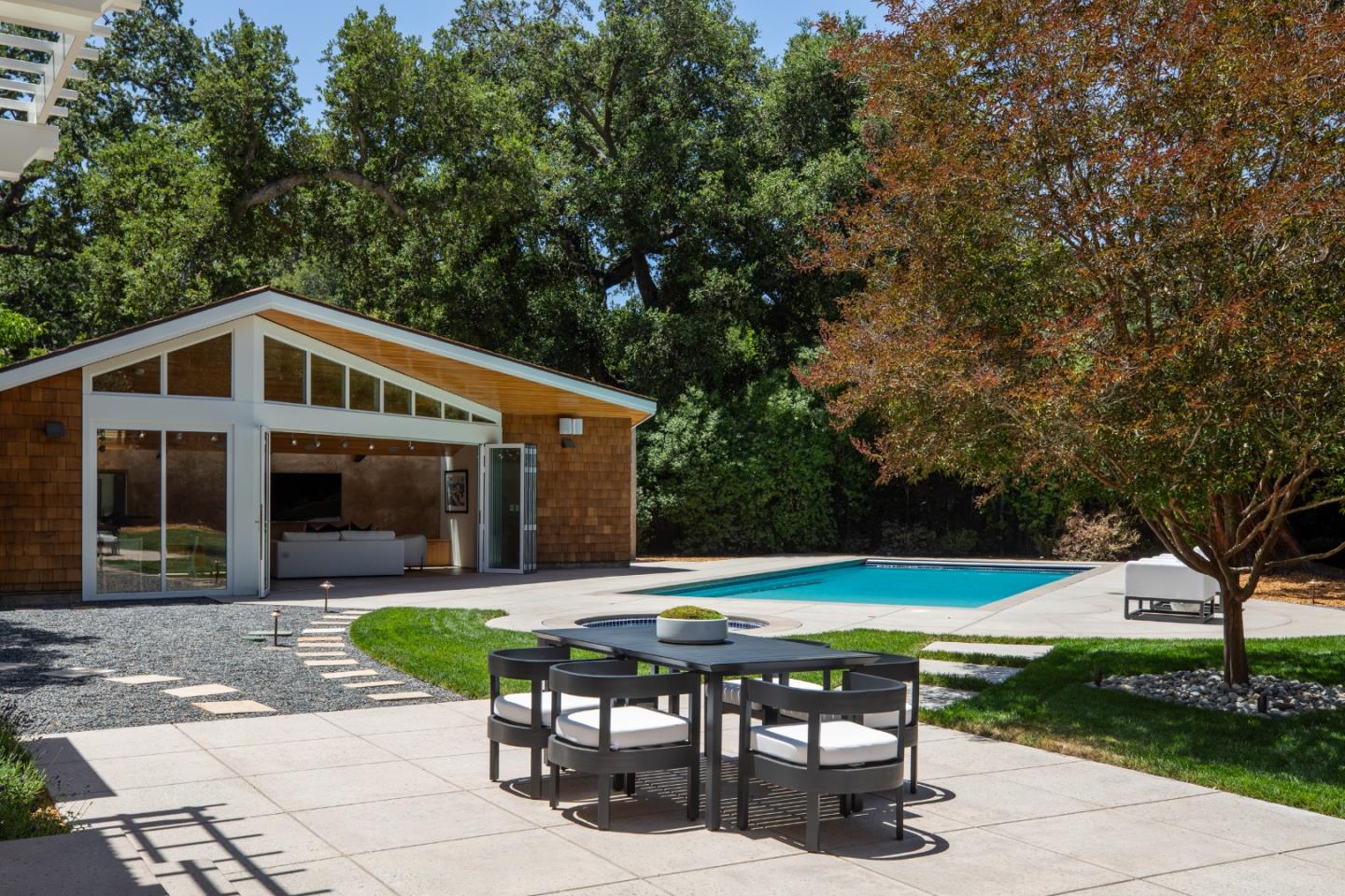 2 Mosswood Way Atherton, CA 94027 - Photo 22 of 38 a front view of a house with garden