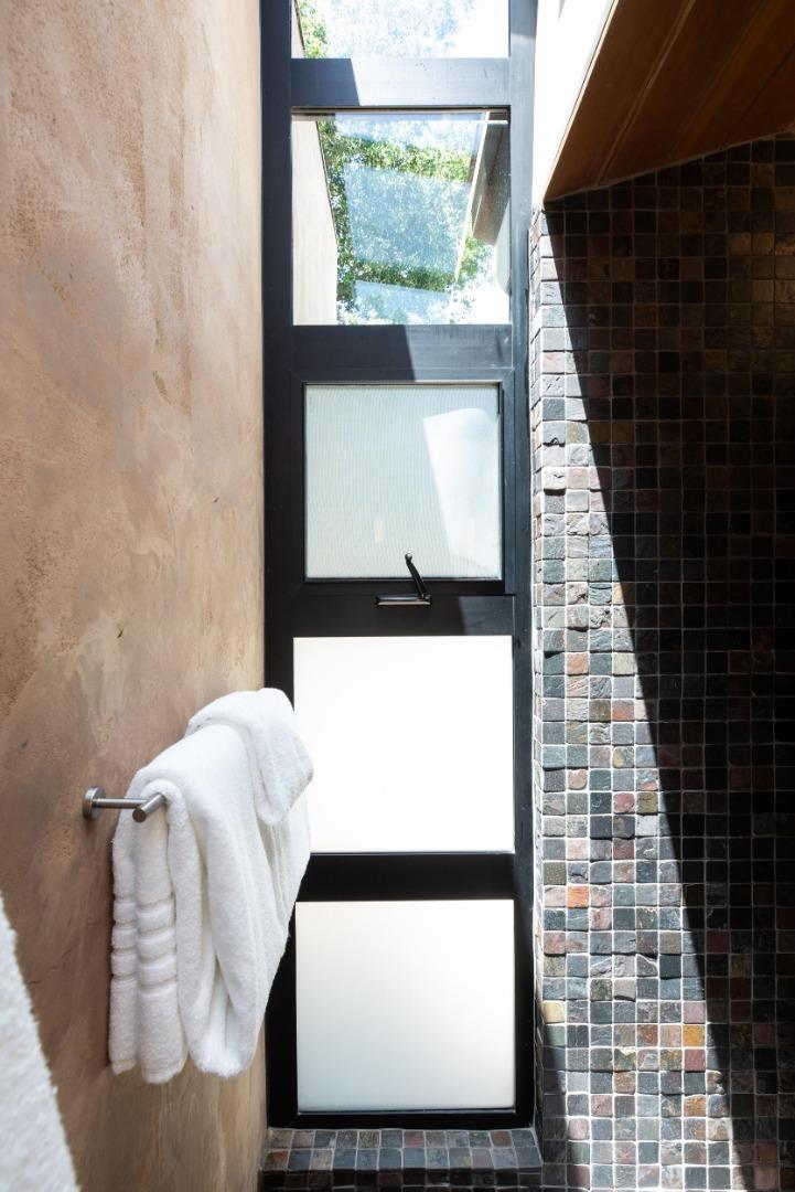 2 Mosswood Way Atherton, CA 94027 - Photo 27 of 38 a picture of a bench in front of a door