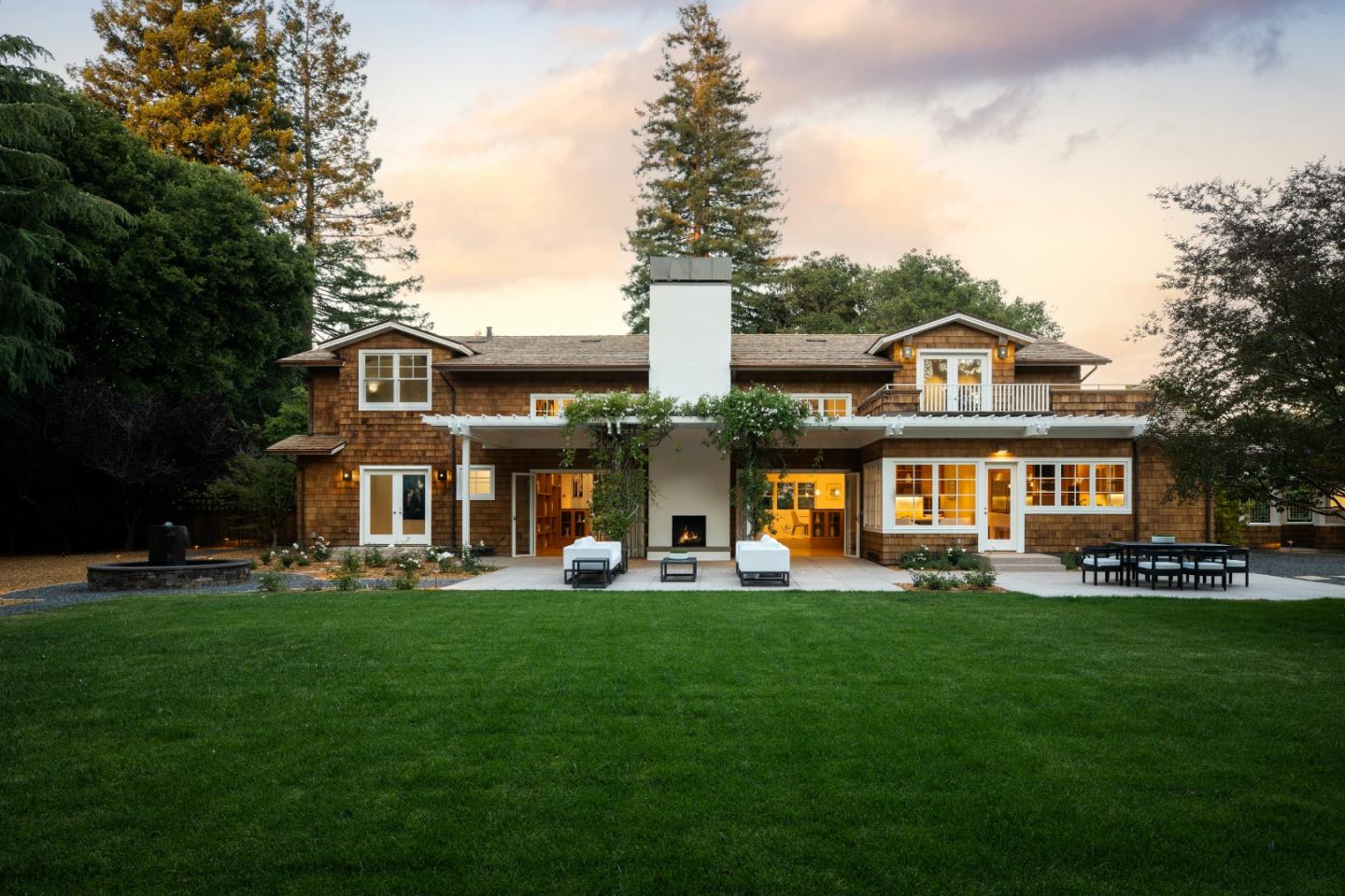 2 Mosswood Way Atherton, CA 94027 - Photo 29 of 38 a front view of a house with a garden and trees