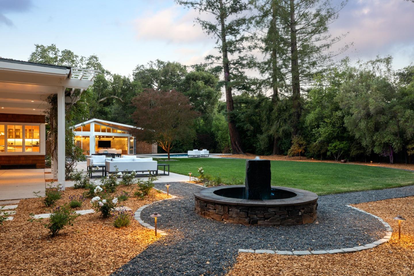 2 Mosswood Way Atherton, CA 94027 - Photo 33 of 38 a view of a fire pit with a bench in a park