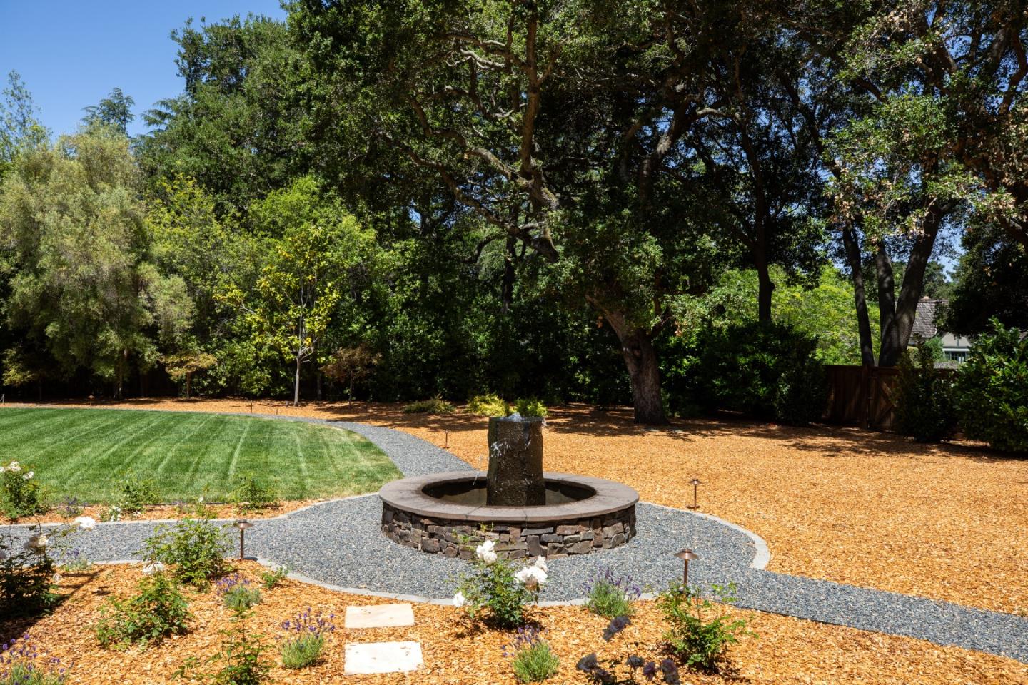 2 Mosswood Way Atherton, CA 94027 - Photo 34 of 38 a water fountain in the middle of a city