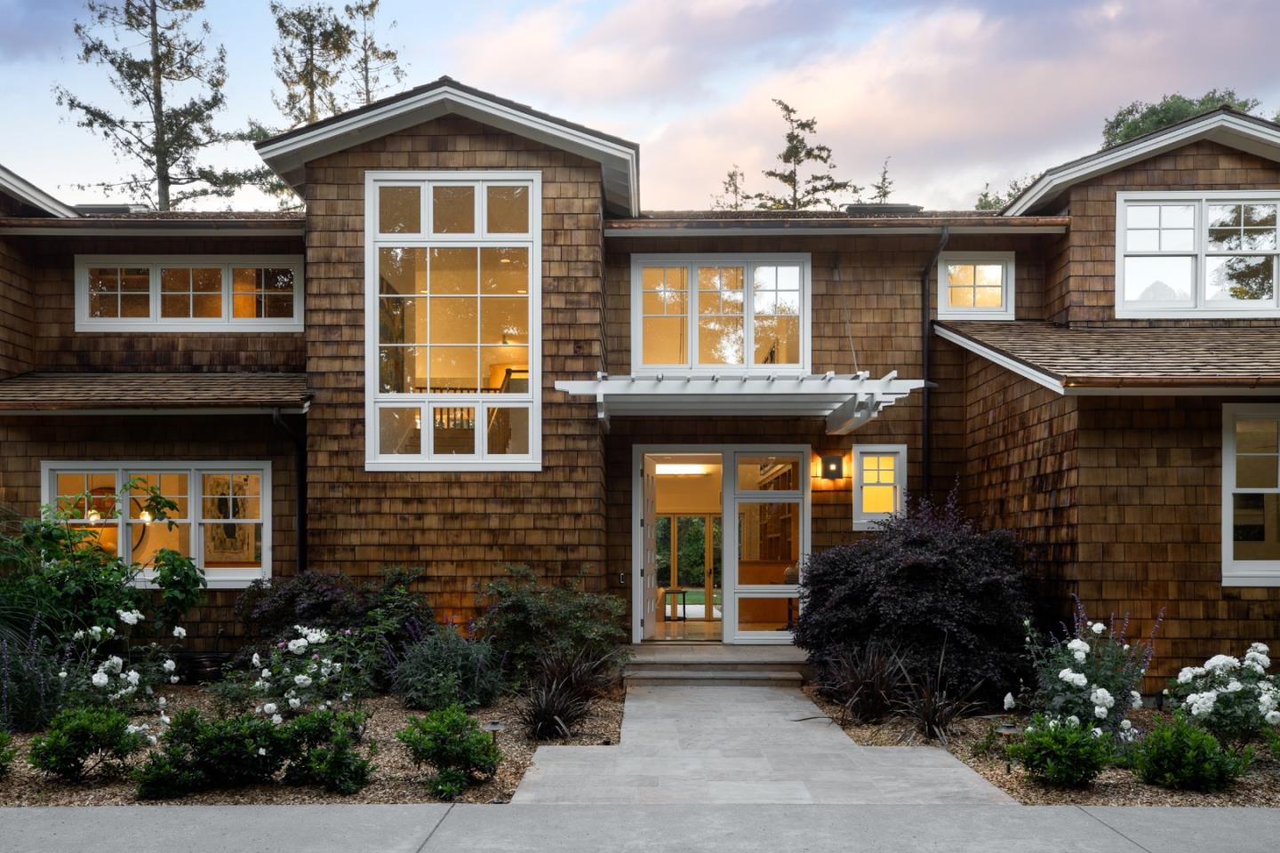 2 Mosswood Way Atherton, CA 94027 - Photo 4 of 38 a front view of a house with garden