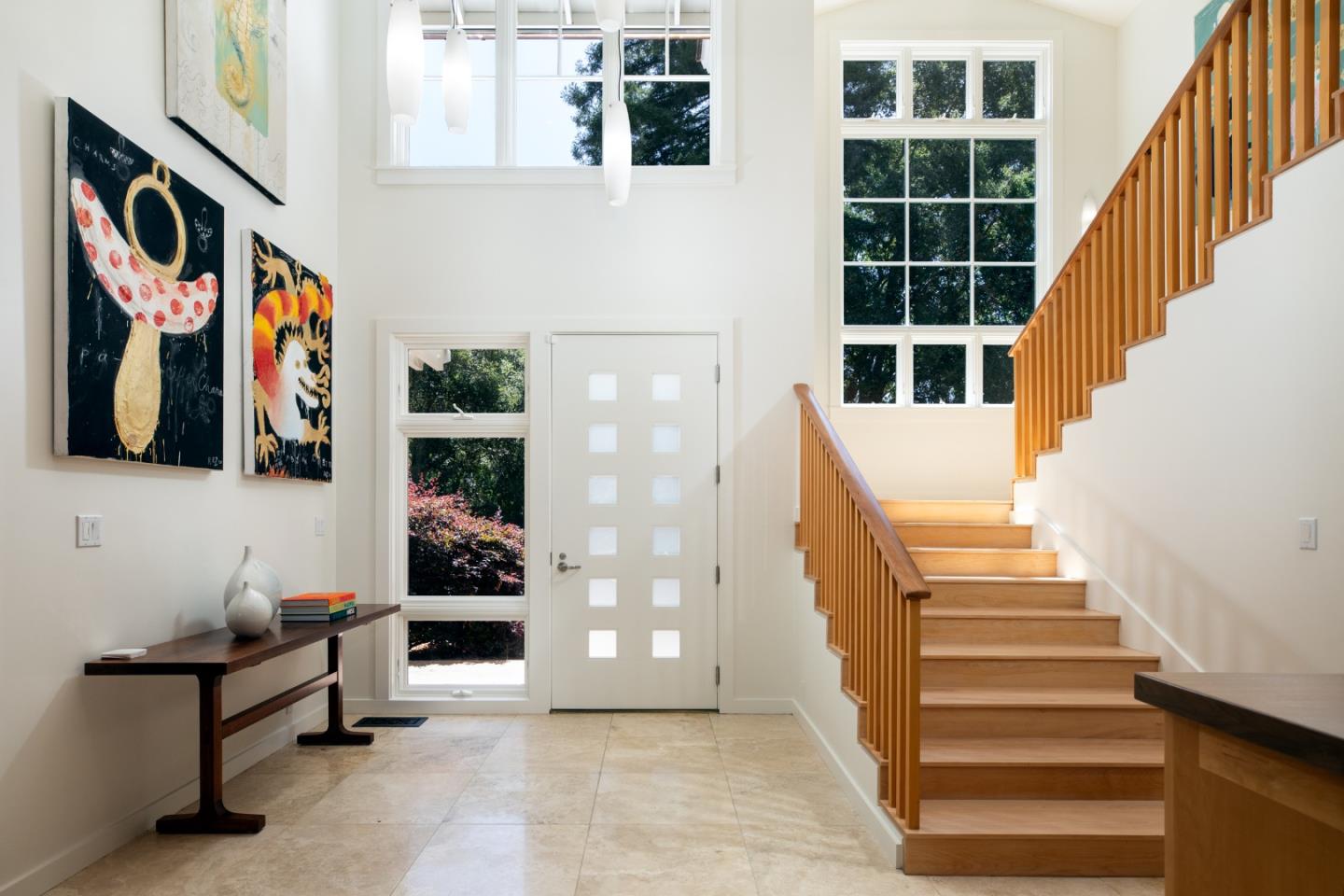 2 Mosswood Way Atherton, CA 94027 - Photo 5 of 38 a view of stairs and an entryway with wooden floor and windows