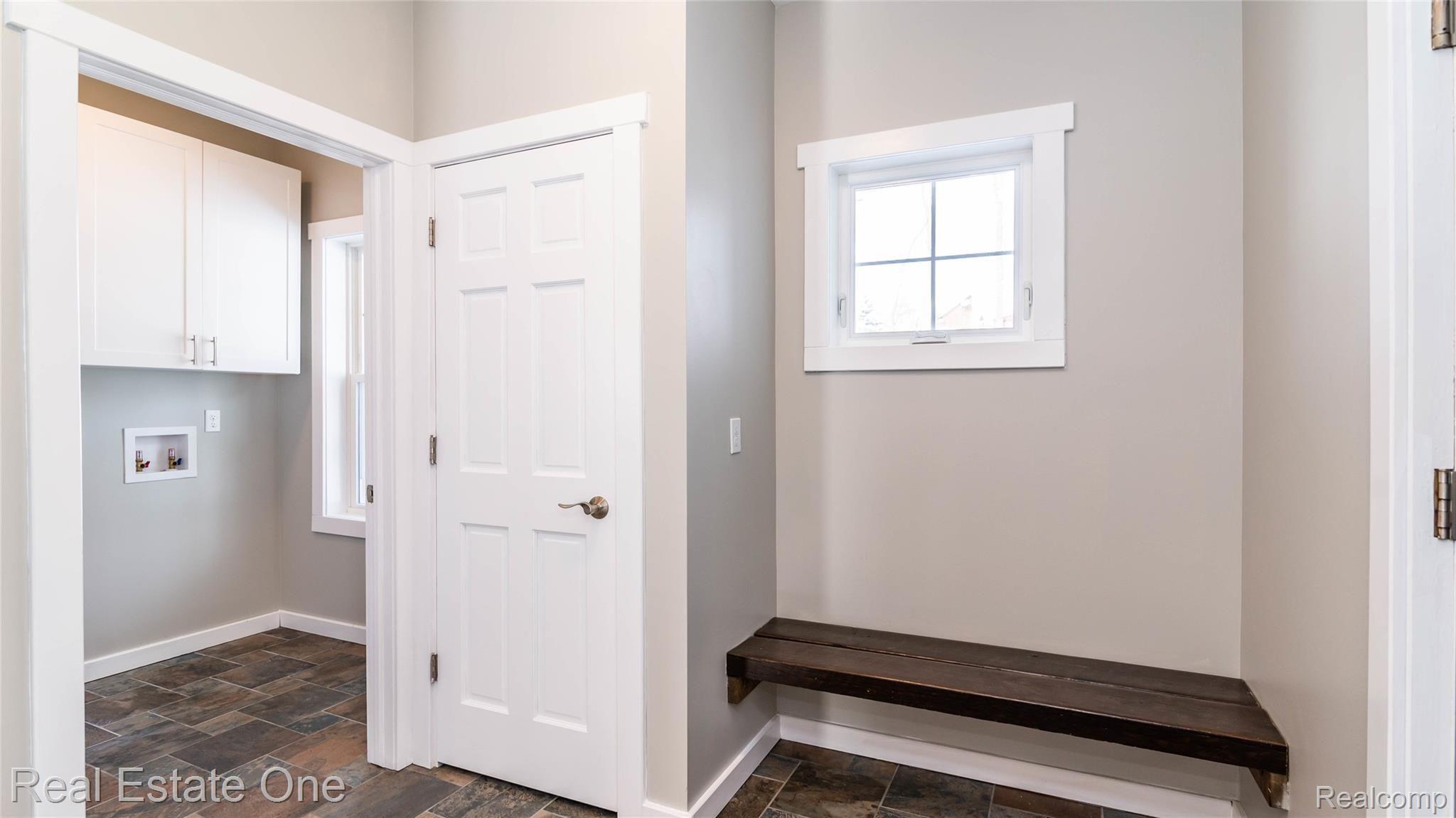4018 Hartland Road Hartland, MI 48353 - Photo 39 of 54 Mud Room to Laundry Room