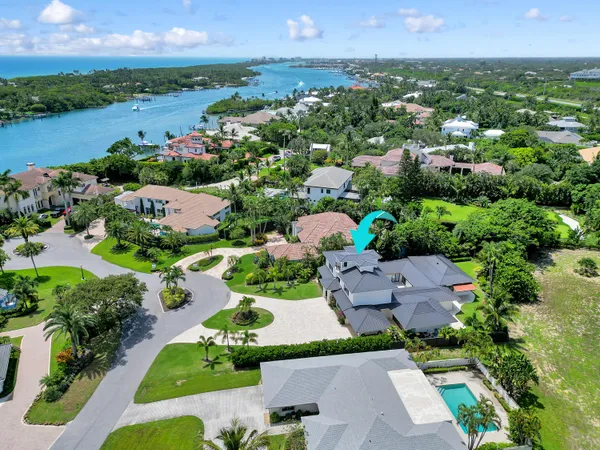 a view of a yard with a swimming pool