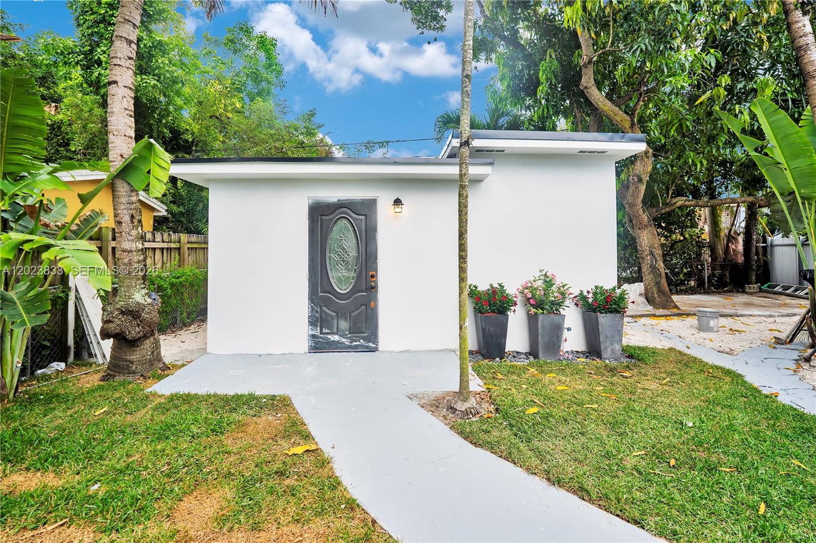 6566 Southwest 35th Street Miami, FL 33155 - Photo 28 of 36 a view of a house with yard and plants
