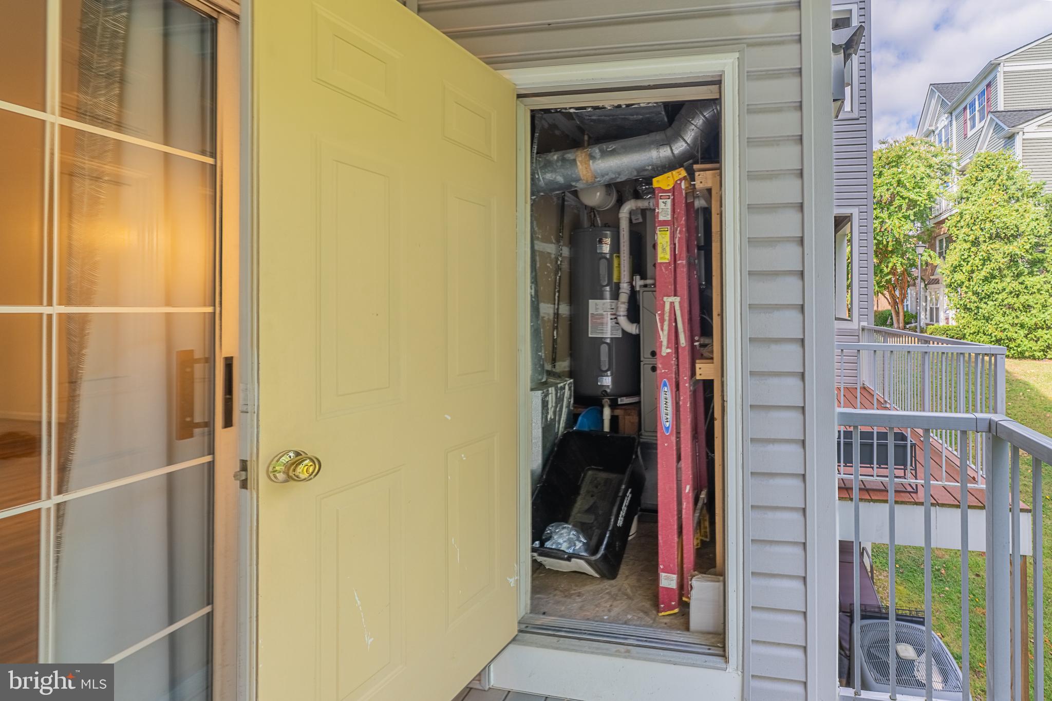 5920 Terrapin Place Alexandria, VA 22310 - Photo 27 of 67 a view of a porch with a door and a wooden bench