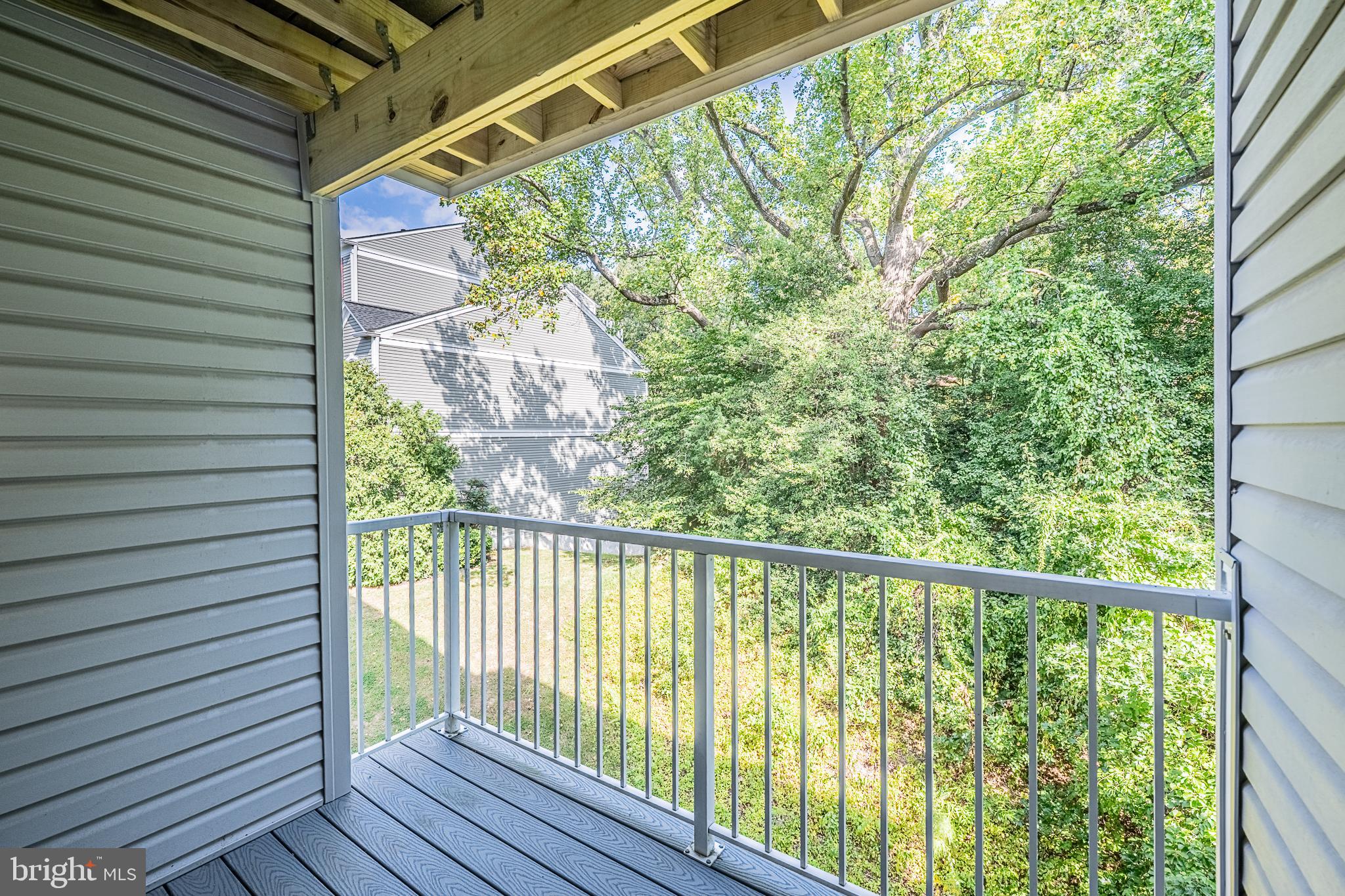 5920 Terrapin Place Alexandria, VA 22310 - Photo 31 of 67 a view of a balcony with wooden floor