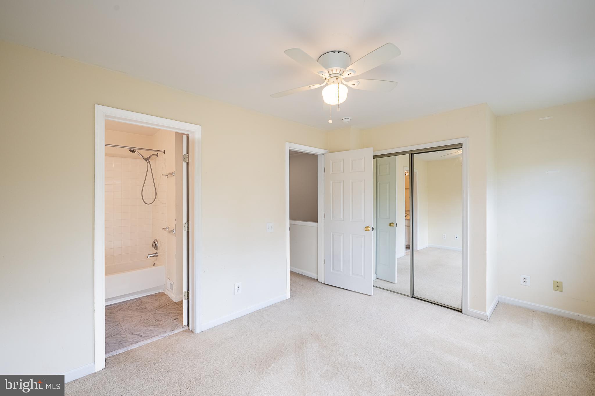 5920 Terrapin Place Alexandria, VA 22310 - Photo 38 of 67 an empty room with closet and a chandelier fan